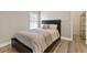 Cozy bedroom with a queen-size bed and an ensuite closet at 9733 Long Meadow Dr, Tampa, FL 33615