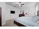 Spacious main bedroom with ensuite bathroom and plenty of closet space at 21395 Southern Charm Dr, Land O Lakes, FL 34637