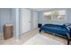 Neat bedroom with tiled floors and bright natural light from the window, perfect for relaxation at 6619 Livingston N Ave, St Petersburg, FL 33702