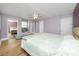 Bedroom with a bed, ceiling fan, a mirrored closet, and a window seat at 6619 Livingston N Ave, St Petersburg, FL 33702
