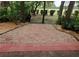 Backyard patio with stepping stone walkway with golf course views at 9 Pelican Pl, Belleair, FL 33756