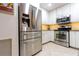 Well-equipped kitchen features modern appliances and ample storage space at 9 Pelican Pl, Belleair, FL 33756