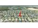 Aerial view of house in residential neighborhood at 1767 Tonka Ter, Wesley Chapel, FL 33543