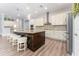 Modern kitchen with granite countertops and white cabinets at 1767 Tonka Ter, Wesley Chapel, FL 33543