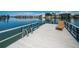 Private dock with lounge chair, offering waterfront access at 11921 Lagoon Ln, Treasure Island, FL 33706