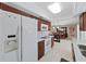 Bright kitchen with stainless steel appliances and wood cabinets at 1385 Embassy Dr, Clearwater, FL 33764