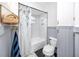 Clean bathroom with subway tile and gray vanity at 6619 Livingston N Ave, St Petersburg, FL 33702