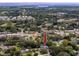 Aerial view of a house in a residential neighborhood near the coast at 6619 Livingston N Ave, St Petersburg, FL 33702