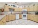 Spacious kitchen with light wood cabinets at 1905 Masters Way, Plant City, FL 33566