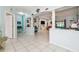 Spacious living room with tiled floors, and access to other rooms at 1905 Masters Way, Plant City, FL 33566