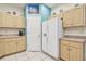 Kitchen with white appliances and corner sink at 1905 Masters Way, Plant City, FL 33566