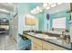 Bathroom with a large vanity, granite countertop, and a walk-in shower at 1905 Masters Way, Plant City, FL 33566