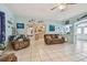 Living room with brown couches and ocean decor at 1905 Masters Way, Plant City, FL 33566