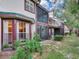 Back exterior showcasing the screened porch at 2669 Sequoia Ter, Palm Harbor, FL 34683