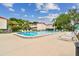 Inviting community pool with lounge chairs at 1655 58Th S Ter # 1, St Petersburg, FL 33712