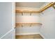 Spacious walk-in closet with custom wooden shelving at 301 1St S St # 1903, St Petersburg, FL 33701