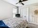 Cozy bedroom with a comfortable bed and plenty of closet space at 2016 Leichester St, Valrico, FL 33594