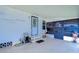Covered patio with storage and access to the home at 3843 Damian Dr, Zephyrhills, FL 33541