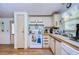 Well-equipped kitchen with white appliances and wood flooring at 3843 Damian Dr, Zephyrhills, FL 33541