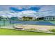 Community tennis court with well maintained grounds at 3843 Damian Dr, Zephyrhills, FL 33541