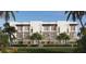 Modern townhomes with balconies and landscaping at 1028 Sunset Point Rd # R10, Clearwater, FL 33755
