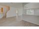 Spacious living area with hardwood floors and high ceilings at 7110 Moss Ledge Run, Land O Lakes, FL 34637