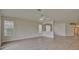 Spacious living room featuring hardwood floors and an open floor plan at 7110 Moss Ledge Run, Land O Lakes, FL 34637