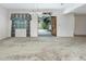 Living room with French doors leading to a courtyard at 4504 W Lamb Ave, Tampa, FL 33629