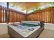 Private outdoor hot tub perfect for relaxation at 1028 Sunset Point Rd # R8, Clearwater, FL 33755