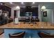 Island kitchen with granite countertops and stainless steel appliances at 10215 Count Fleet Dr, Ruskin, FL 33573