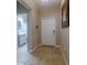 Bright entryway with tile floors and access to a half bathroom at 10215 Count Fleet Dr, Ruskin, FL 33573