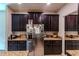 Kitchen with ample cabinetry and granite countertops at 10215 Count Fleet Dr, Ruskin, FL 33573
