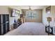 Spacious bonus room with large window and carpeted floor at 10215 Count Fleet Dr, Ruskin, FL 33573
