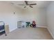 Spacious bedroom featuring ceiling fan and ample floor space at 10215 Count Fleet Dr, Ruskin, FL 33573