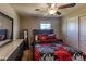 Bedroom with a bed, dresser and ceiling fan at 10215 Count Fleet Dr, Ruskin, FL 33573
