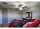 Bedroom with a bed, dresser and ceiling fan at 10215 Count Fleet Dr, Ruskin, FL 33573