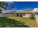 Spacious backyard with covered patio and grassy area at 10215 Count Fleet Dr, Ruskin, FL 33573