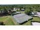 Community tennis courts with surrounding landscape at 12506 Ashdown Dr, Odessa, FL 33556