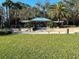 Park pavilion with seating offers residents an ideal area to gather and socialize at 4251 Preserve Pl, Palm Harbor, FL 34685