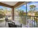 Enjoy the views from this comfortable screened patio with water views at 4251 Preserve Pl, Palm Harbor, FL 34685