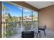 Enjoy the screened patio offering relaxing views of the water and surrounding landscape at 4251 Preserve Pl, Palm Harbor, FL 34685