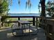 Community picnic area overlooking the lake provides a relaxing spot for outdoor dining at 4251 Preserve Pl, Palm Harbor, FL 34685