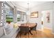 Cozy breakfast nook with built-in bench seating and window views at 4940 Willow Ridge Ter, Valrico, FL 33596