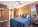 Bright bedroom with king-size bed and access to bathroom at 4940 Willow Ridge Ter, Valrico, FL 33596