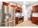 Updated kitchen with stainless steel appliances and ample wood cabinetry at 4940 Willow Ridge Ter, Valrico, FL 33596