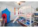 Playful bedroom with bunk beds and a play tent at 4940 Willow Ridge Ter, Valrico, FL 33596