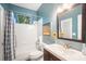 Clean bathroom with shower/tub combo and updated vanity at 4940 Willow Ridge Ter, Valrico, FL 33596