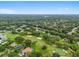 Aerial view of a luxury community with golf course and lush landscaping at 4940 Willow Ridge Ter, Valrico, FL 33596