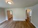 Open living area with wood floors and archways at 1650 Prescott S St, St Petersburg, FL 33712