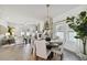 Elegant dining room with round table and striped chairs at 209 W Emma St, Tampa, FL 33603